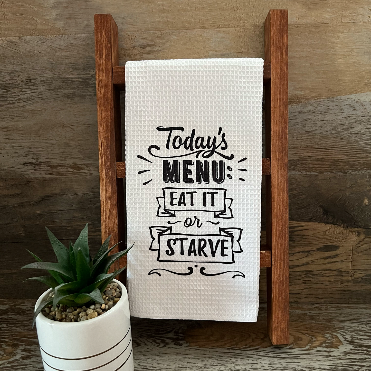 White waffle weave kitchen towel with funny saying, todays menu, eat or or starve